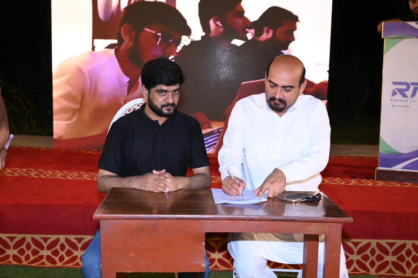 MOU signing between RTT — Razinio Tech Training and Informatics College